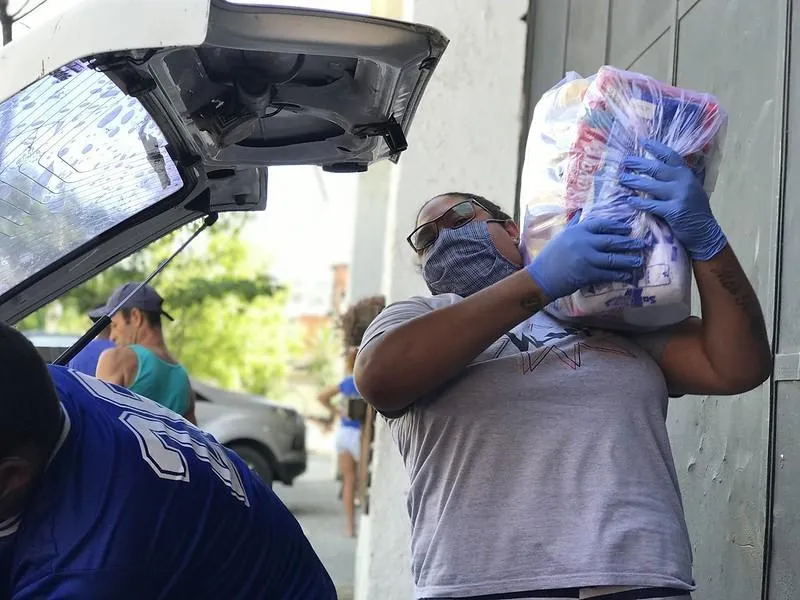 Women distributing food parcels