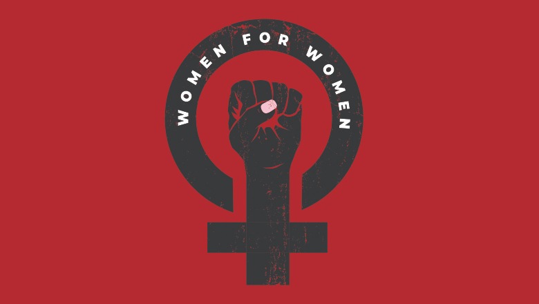 Logo of fist with words women for women