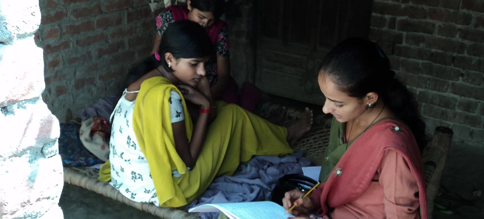 A group of Indian women read together