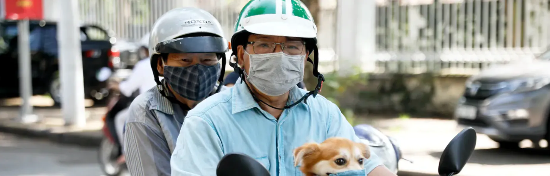 Vietnamese man on scooter