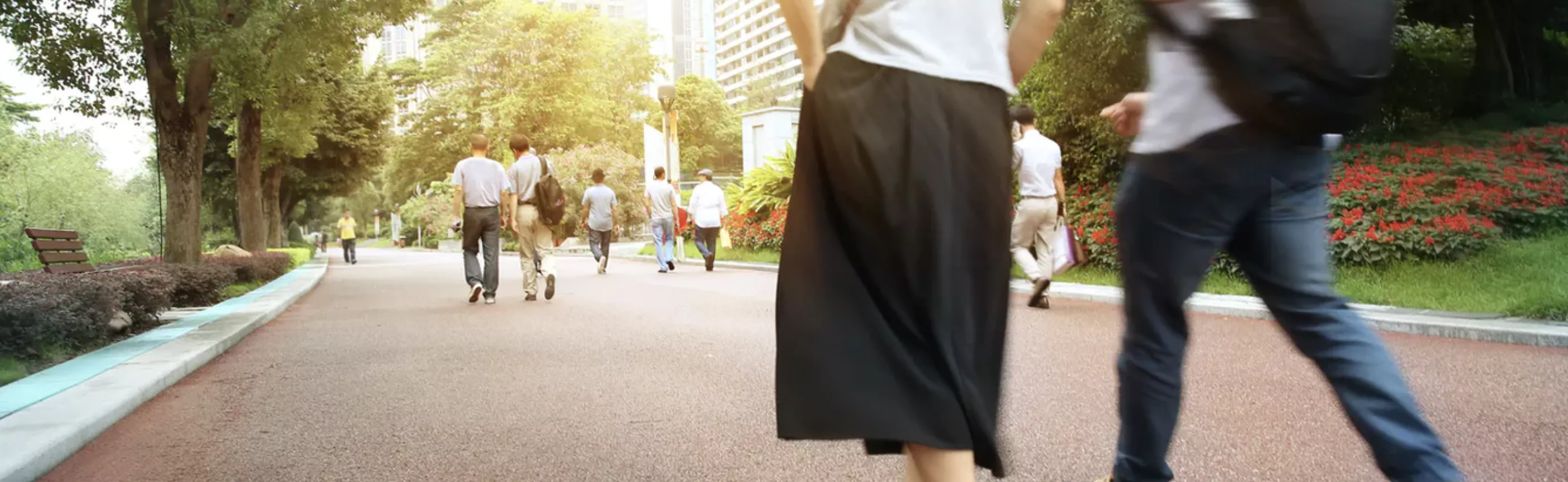 People walking on a path in China. sevenke/Shutterstock