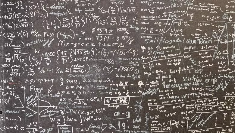 blackboard covered with numbers and maths symbols - 780x440