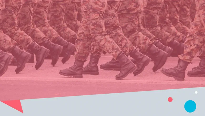 Feet of military men walking, with a pink overlay.