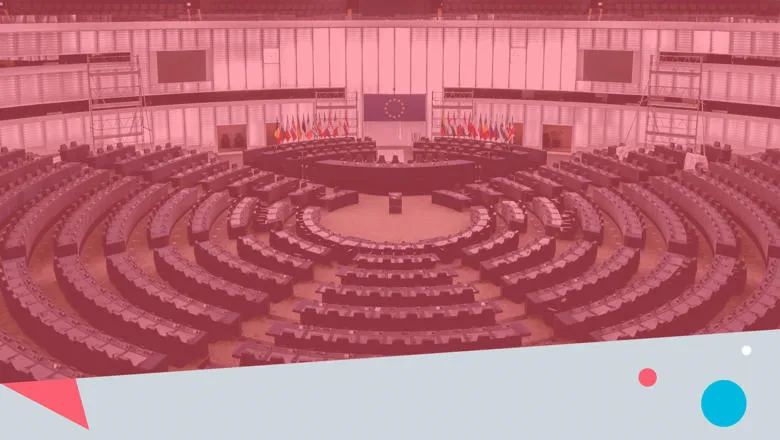 An empty United Nations meeting room, with a pink overlay.