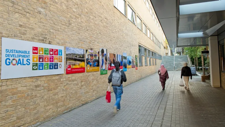 outdoor university corridor with posters explaining sustainable development goals