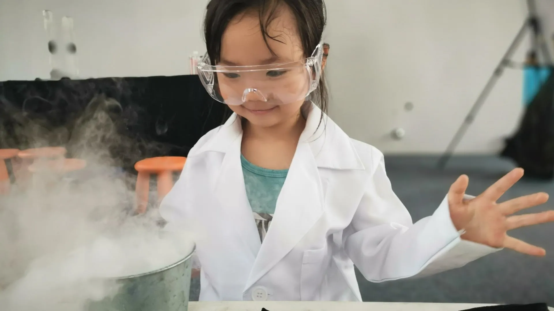 girl with glasses doing science - yy-teoh-2000x1100