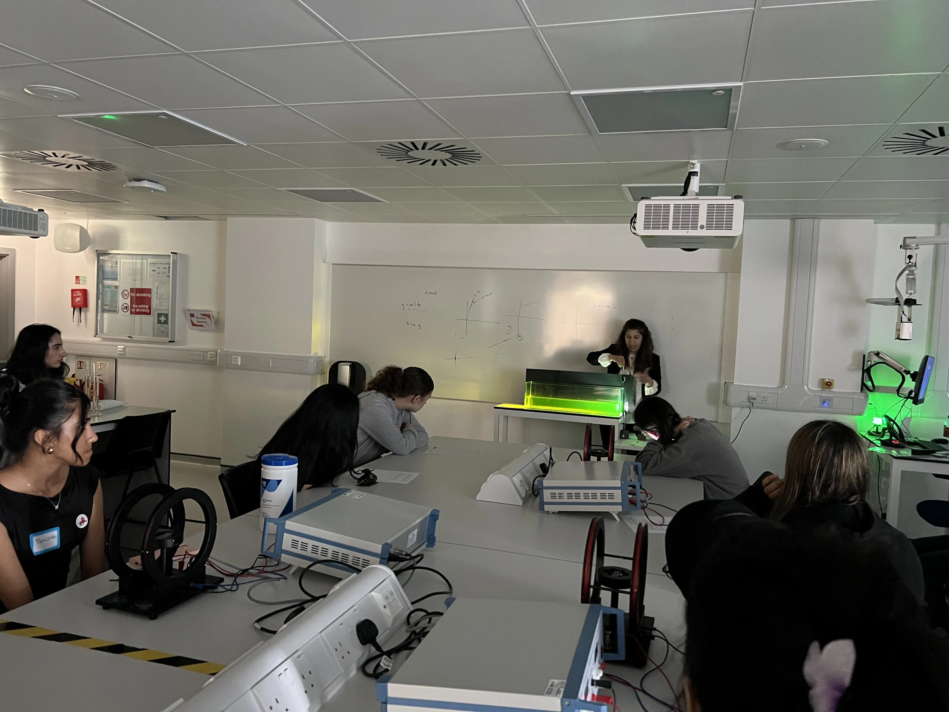 girls listening to lecture in physics