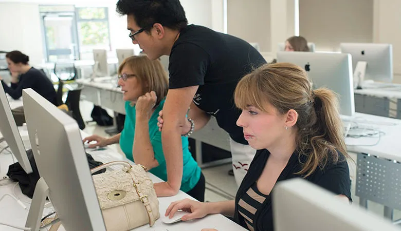 Teaching in a classroom with computers