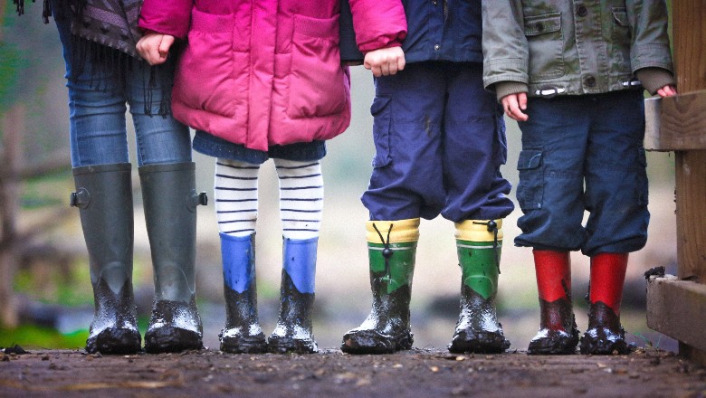 4 children with muddy boots - by ben wicks