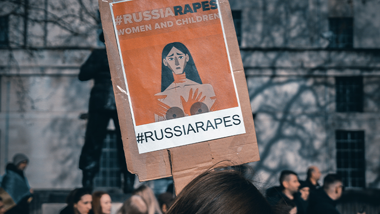 Placard at demonstration about sexual violence in the Ukraine war