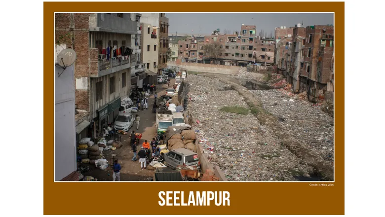 Image of rubbish site in Seelampur India formatted as a postcard
