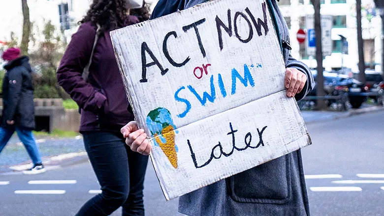 banner held at climate action protest