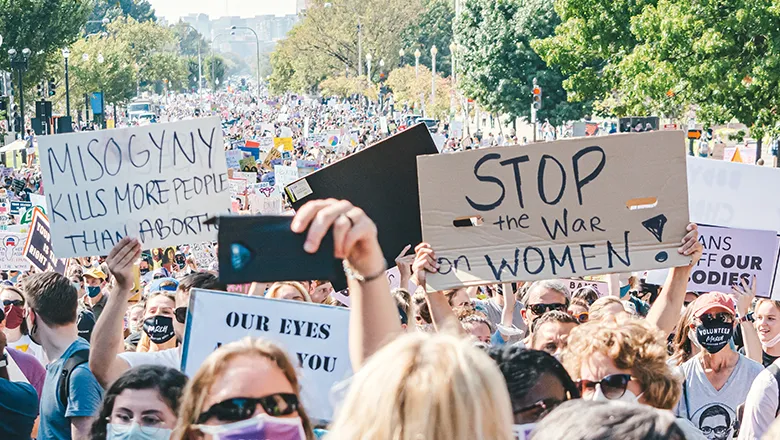 image of a protest march over women's rights