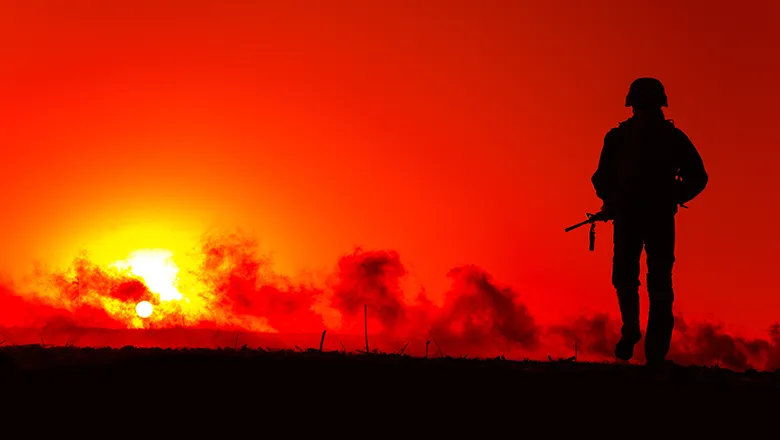 Image showing soldier against a red sky