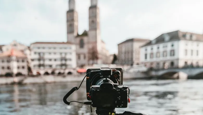 Camera in front of a landscape