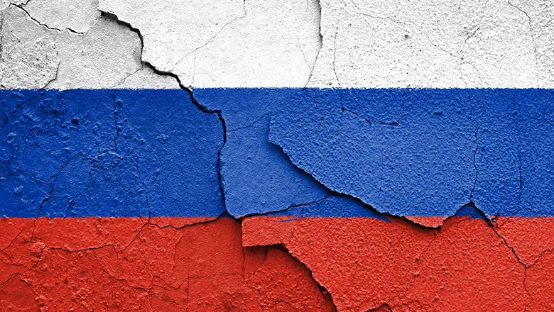 Russia flag painted on cracked concrete