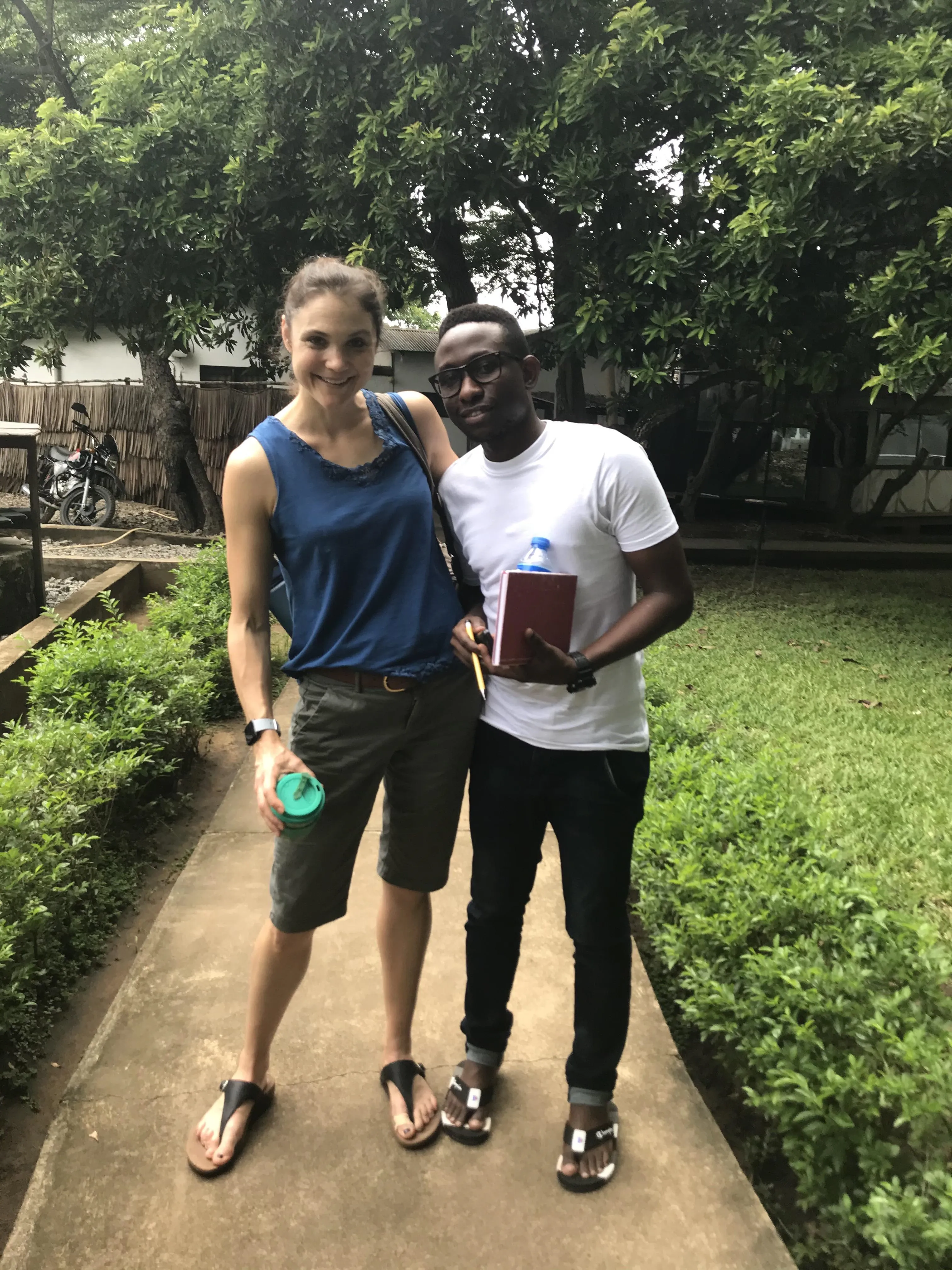 Ann Kelly with her project partner, Salum Abdallah Mapua, planning a project on community perceptions of swarm behaviour