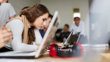 Student working on a laptop, King's College London