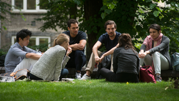 Students talking outside the Maughan Library, King's College London