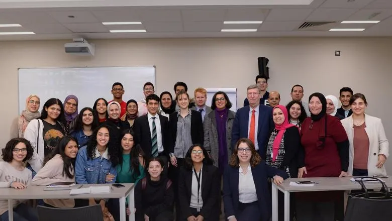 The King's College London team with staff and students at New Giza University, in Egypt.