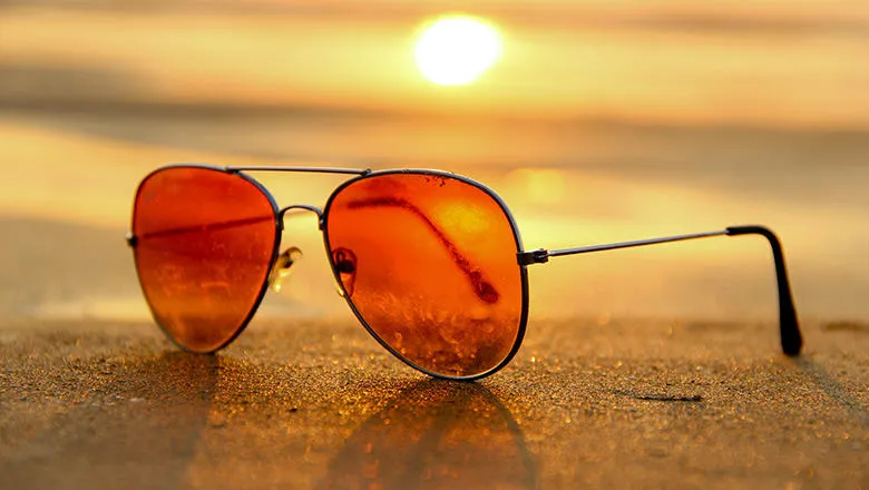 sunglasses on a beach