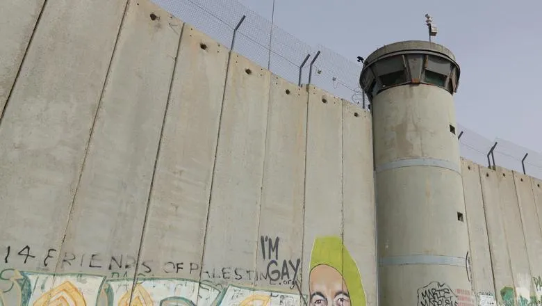 A border wall between Israel and the West Bank.