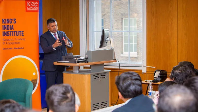 India's High Commissioner to the UK Vikram Doraiswami delivering a lecture to an audience at King's