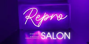 Neon sign with the words 'Repro Salon'