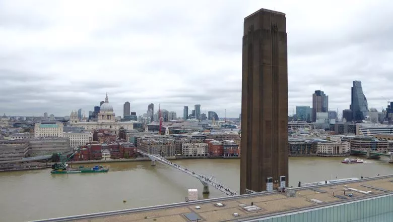 A view of the Tate Modern chimney with the St Pau;'s visible on the opposite bank of the Thames