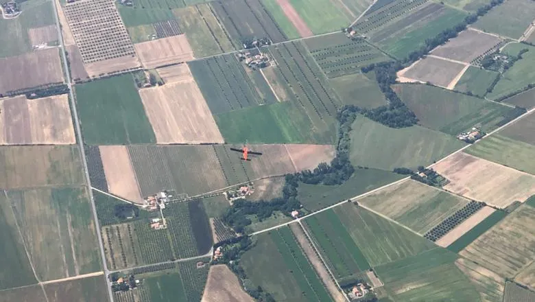 View of the Kenn Borek Aircraft (with the NASA HyTES sensor) from above during a two aircraft flight in Italy.