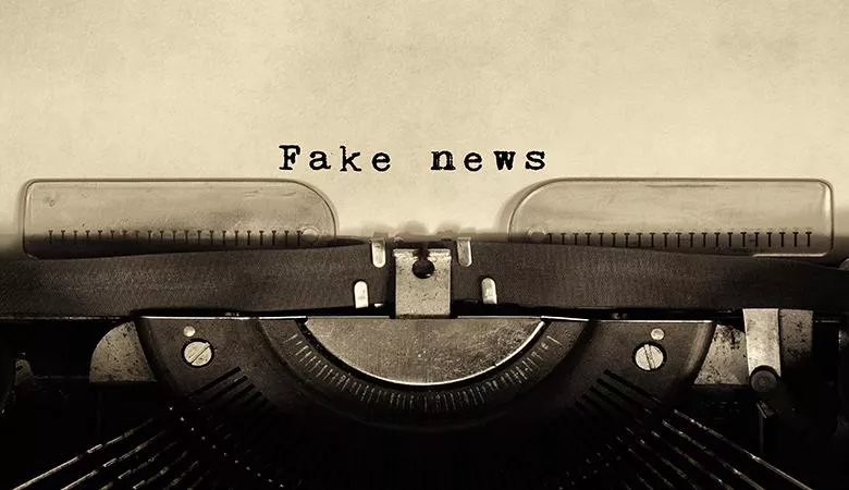 'Fake news' written on a typewriter