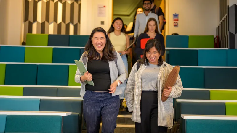 Students entering an amphitheatre.