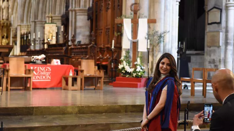 Image of graduate inside Southwark Cathedral