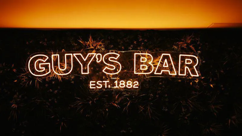 Logo showing KCLSU Guys Bar - est 1882