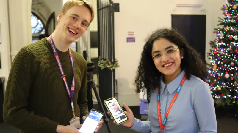A librarian and student with the King's Student App