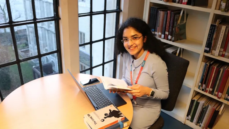 A student reading a book