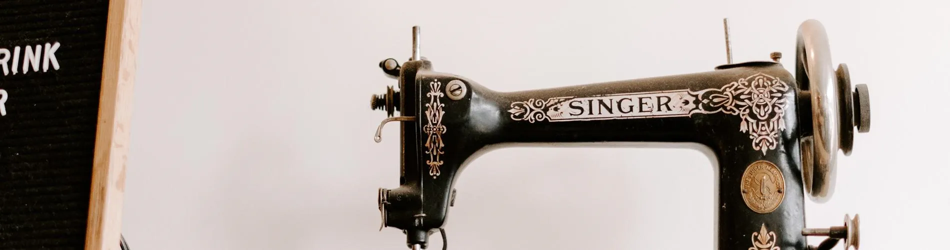 a sewing machine on a shelf