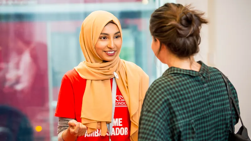 Student Ambassador talking with a student