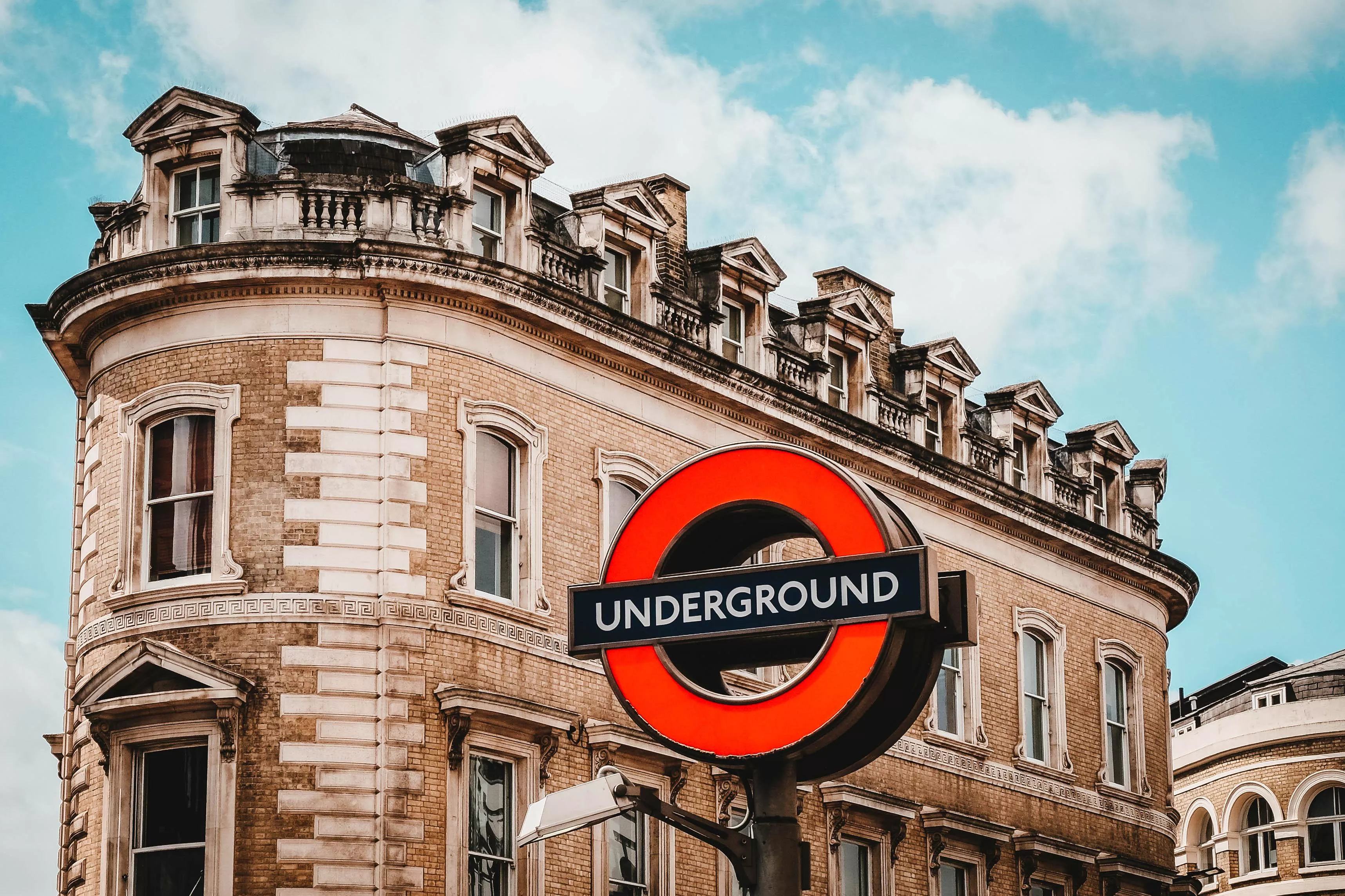 London underground sign against a Victorian corner building