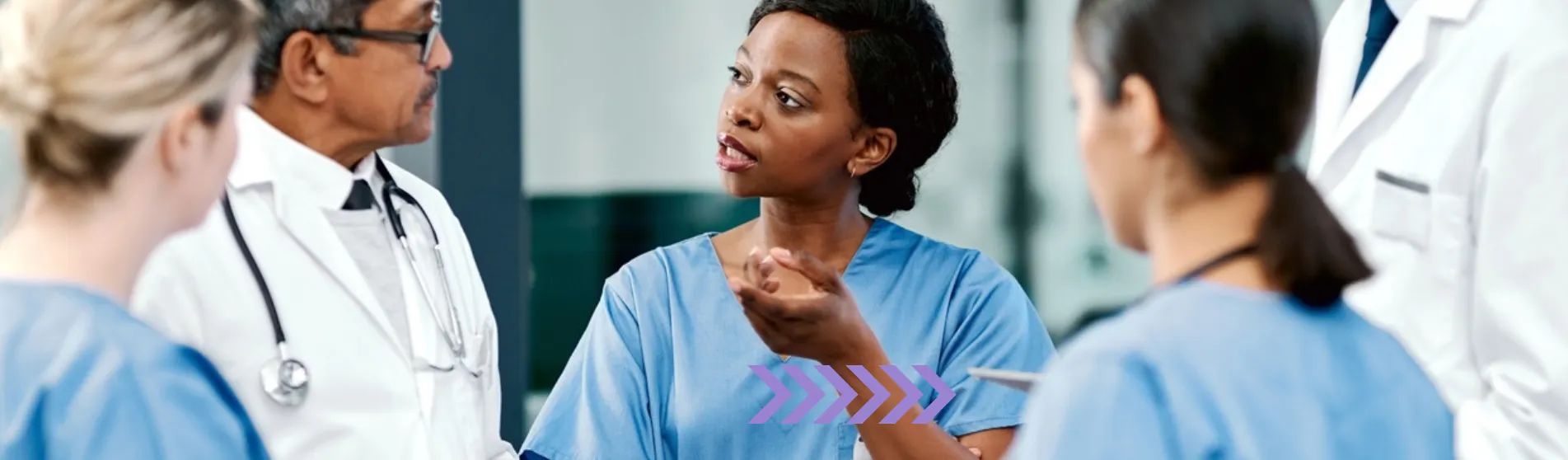 Nurses speaking with doctors