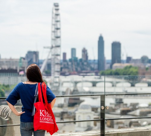 Mini Promo Student with King's bag on Waterloo Bridge
