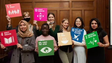 LSSC '22 group of students holding SDGs