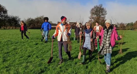 Volunteers planting trees