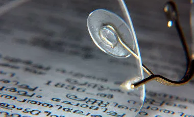 Spectacles resting on a book