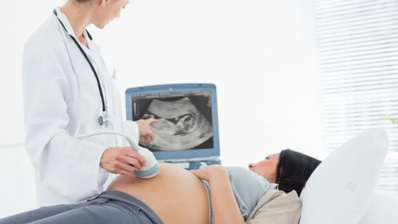 Woman having scan (Canva
